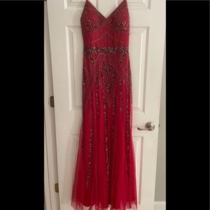 Gorgeous Marina Red sequined gown.